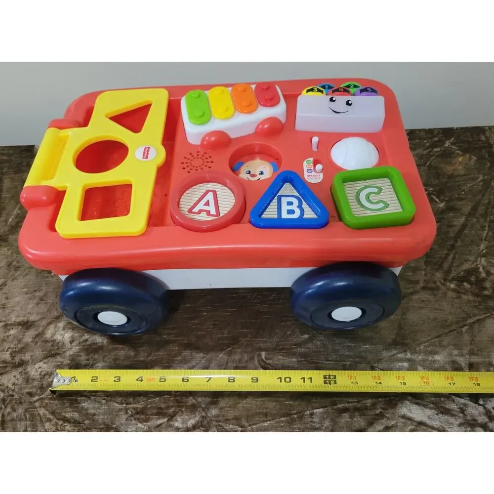 ​Fisher-Price Laugh & Learn Pull & Play Learning Wagon Musical Toddler Toy